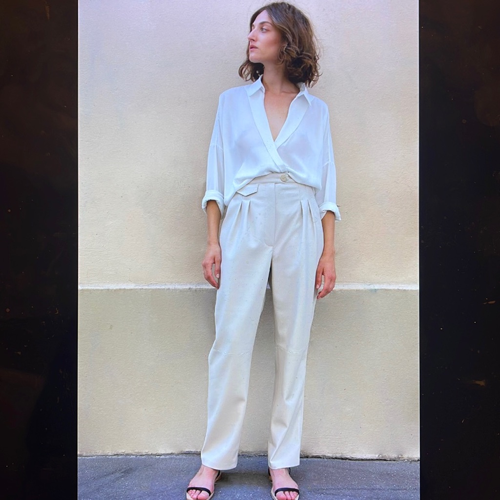 Nanushka Mitsu Pleat Front Cigarette Pants In Crme Vegan Leather